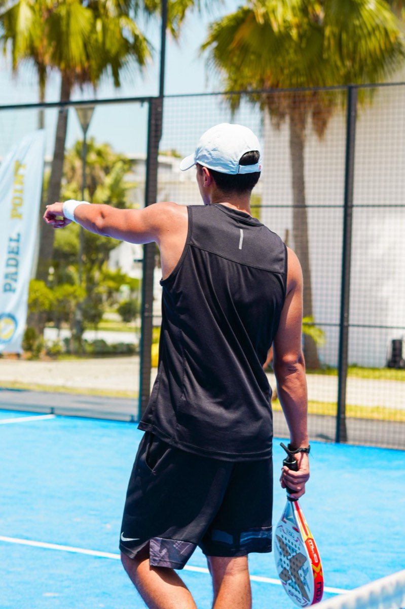 Padel player at the net